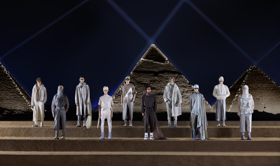 Models pose in the Dior men's pre-fall 2023 collection in Giza, Egypt.