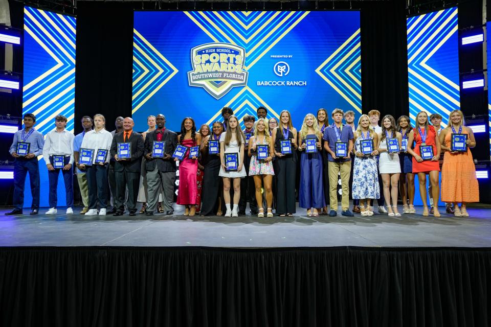 Winners pose with their plaques during the Southwest Florida High School Sports Award at Suncoast Credit Union Arena in Fort Myers on Thursday, June 6, 2024.