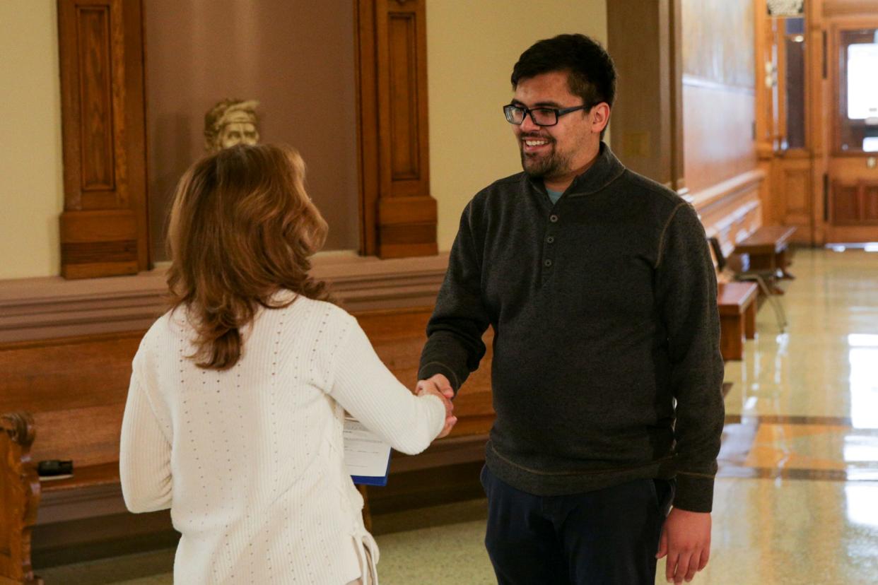 Angel Valentin, right, is sworn in as interim Wabash Township Trustee by Tippecanoe County Clerk Julie Roush, Thursday, Jan. 6, 2022 in Lafayette.