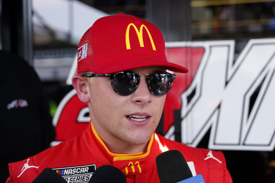 NASCAR driver Ty Gibbs talks to reporters before a NASCAR Cup Series auto race at Pocono Raceway, Sunday, July 24, 2022 in Long Pond, Pa. (AP Photo/Matt Slocum)