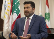 Lebanese Energy Minister Raymond Ghajar speaks during an interview in Beirut, Lebanon, Thursday, July 16, 2020. Lebanon's worsening economic crisis which culminated with the tiny nation defaulting on its debt this year is making it increasingly difficult to attract investors to the country's ailing electricity sector, which has been a huge drain on state coffers for decades, Ghajar said. (AP Photo/Hassan Ammar)