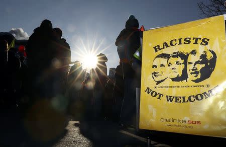 Activists prepare placards in front of the building where European far-right leaders meet, in Koblenz, Germany, January 21, 2017. REUTERS/Kai Pfaffenbach