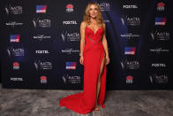 <p>El 7 de diciembre se celebraron los AACTA Awards en Sídney (Australia). Elsa Pataky acudió al evento y deslumbró con este vestido rojo, prenda firmada por J'Aton Couture. (Foto: Caroline McCredie / Getty Images)</p> 