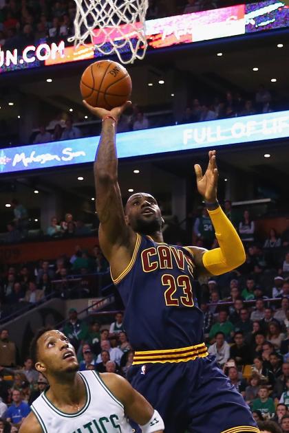 BOSTON, MA - APRIL 23: LeBron James #23 of the Cleveland Cavaliers takes a shot over Evan Turner #11 of the Boston Celtics during the first quarter of their game in the first round of the 2015 NBA Playoffs at TD Garden on April 23, 2015 in Boston, Massachusetts. NOTE TO USER: User expressly acknowledges and agrees that, by downloading and/or using this photograph, user is consenting to the terms and conditions of the Getty Images License Agreement. (Photo by Maddie Meyer/Getty Images)