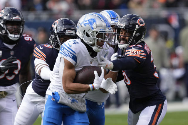 Lions overcome big effort by Fields, beat Bears 31-30