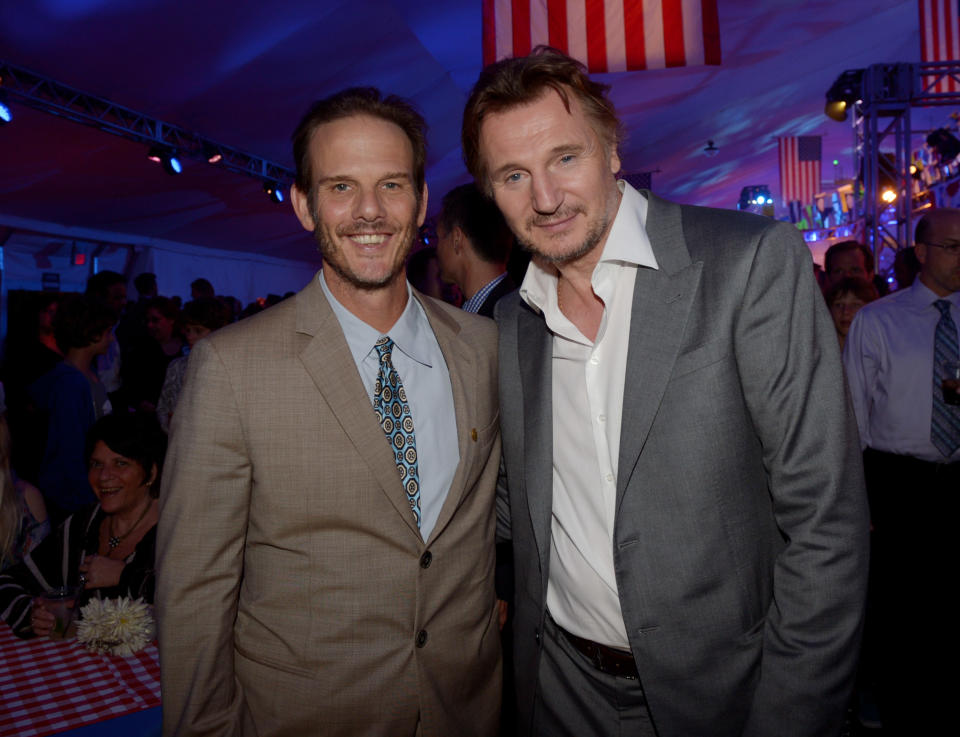 LOS ANGELES, CA - MAY 10: Producer/director Peter Berg (L) and actor Liam Neeson pose at the after party for the premiere of Universal Pictures' "Battleship" at L.A. Live on May 10, 2012 in Los Angeles, California. (Photo by Kevin Winter/Getty Images)