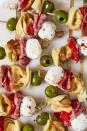 <p>Fresh <a href="https://www.delish.com/cooking/recipe-ideas/g40627038/tortellini-recipes/" rel="nofollow noopener" target="_blank" data-ylk="slk:tortellini;elm:context_link;itc:0;sec:content-canvas" class="link ">tortellini</a> make these the hearty savory snack of our Valentine dreams. If you're not a fan of olives, pepperoncini peppers would be a delicious substitute! Just don't skip those artichoke... hearts!</p><p>Get the <strong><a href="https://www.delish.com/cooking/recipe-ideas/recipes/a48544/antipasto-bites-recipe/" rel="nofollow noopener" target="_blank" data-ylk="slk:Antipasto Bites recipe;elm:context_link;itc:0;sec:content-canvas" class="link ">Antipasto Bites recipe</a></strong>.</p>