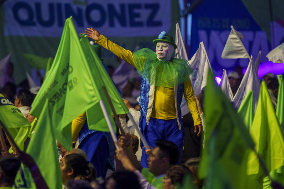 A stilt walker cheers for Zury Rios Sosa, Presidential candidate of the Valor and Unionista coalition during a closing campaign rally in Guatemala City, Thursday, June 22, 2023. Guatemalans go to the polls on June 25. (AP Photo/Moises Castillo)