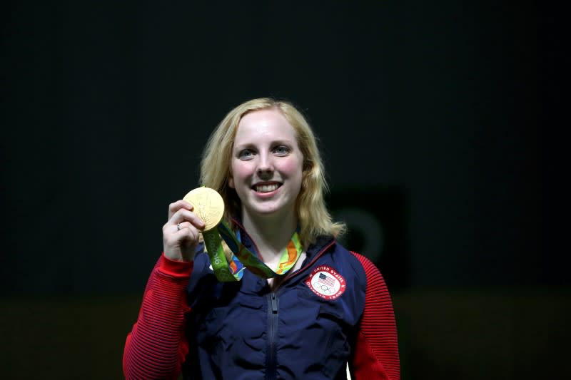 Virginia Thrasher (USA) of USA poses with her gold medal. REUTERS/Edgard Garrido