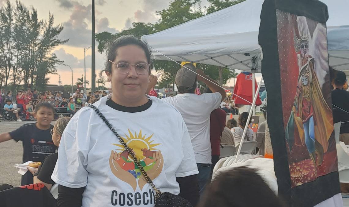 Scarleth Herrera, wearing a Cosecha shirt, poses at an outdoor event. The Somos Salud Cosecha project, which ran from August 2021 to July, aimed to address health inequities faced by Latino migrants and farm workers.
