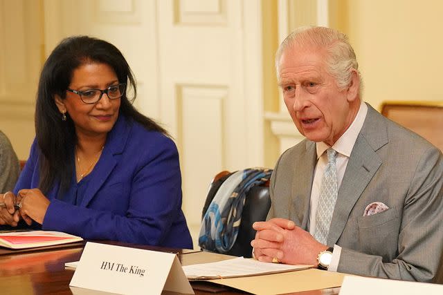 <p>JONATHAN BRADY/POOL/AFP via Getty Images</p> King Charles meets with community faith leaders at Buckingham Palace on March 26, 2024.