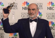 FILE - In this file photo dated Sunday, Jan. 21, 1996, Sean Connery is honored at the Golden Globe Awards, in Beverly Hills, Calif., USA, when he received the Cecil B. DeMille Award. Scottish actor Sean Connery, considered by many to have been the best James Bond, has died aged 90, according to an announcement Saturday Oct. 31, 2020, from his family. (AP Photo/Mark J. Terrill, FILE)