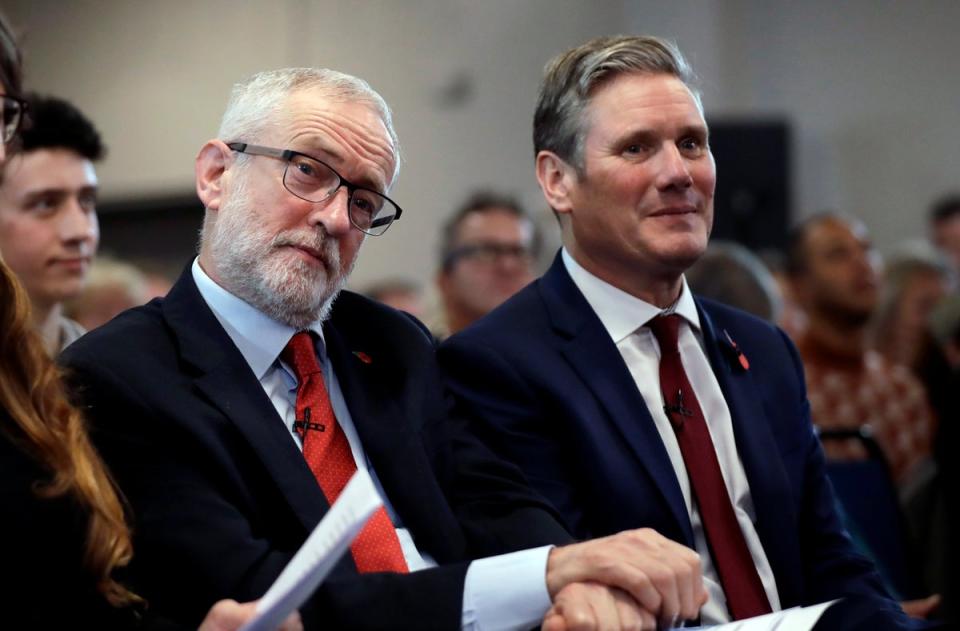 Corbyn sits next to Starmer, who was Shadow Secretary of State for Exiting the European Union, in 2019 (AP)