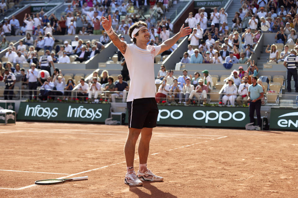 Thiago Seyboth Wild celebrates his win over Daniil Medvedev.