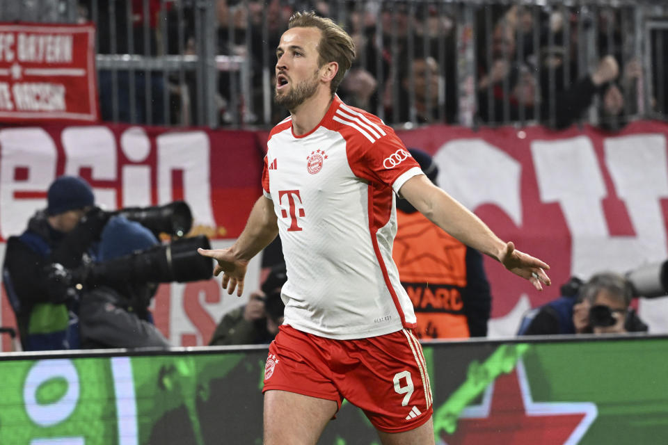 Bayern's Harry Kane celebrates after scoring his side's third goal during the Champions League round of 16 second leg soccer match between FC Bayern Munich and Lazio at the Allianz Arena stadium in Munich, Germany, Tuesday, March 5, 2024. (Sven Hoppe/DPA via AP)