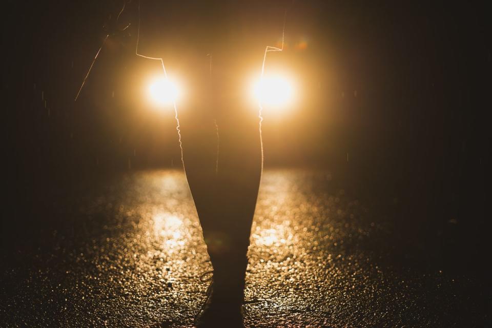 spooky urban legends   headlights shining on legs at night