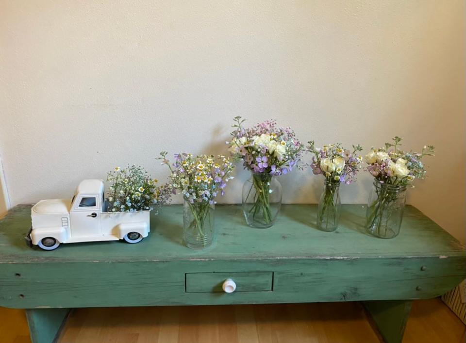 A bench Gloria John found for free on the side of the road in San Antonio sits in her bedroom. The 21-year-old said it feels good to not spend money on items that would have gone in the trash.