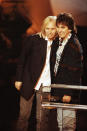 <p>Tom Petty and fellow Traveling Wilbury George Harrison are captured together at the Billboard Music Awards in Los Angeles, Dec. 9, 1992. (Photo: Reed Saxon/AP) </p>