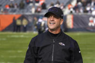 Baltimore Ravens head coach John Harbaugh walks the sidelines before an NFL football game against the Chicago Bears Sunday, Nov. 21, 2021, in Chicago. (AP Photo/Charles Rex Arbogast)
