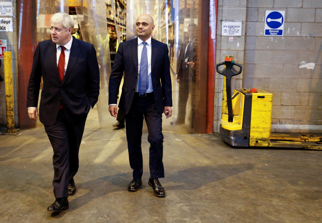 Prime Minister Boris Johnson (left) and the Chancellor of the Exchequer Sajid Javid during a visit to Bestway Wholesale in Manchester.
