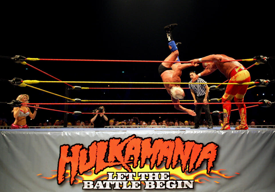 <p>Hulk Hogan throws his opponent Ric Flair to the floor during Hulk Hogan’s Hulkamania Tour at Rod Laver Arena on November 21, 2009 in Melbourne, Australia. (Photo by Mark Dadswell/Getty Images) </p>