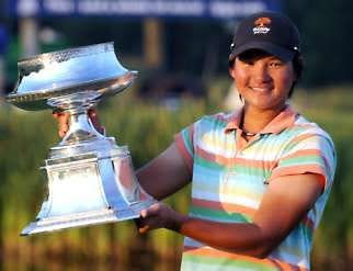 Yani Tseng holds the trophy after winning the LPGA Championship at Bulle Rock Golf Course in Havre de Grace, Md., Sunday. At 19, Tseng is the youngest player to win the tournament. Gail Burton | Associated Press