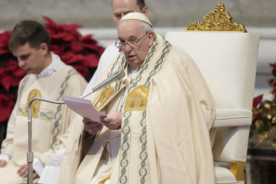 Pope Francis holds a Mass for the solemnity of St. Mary at the beginning of the new year, in St. Peter's Basilica at the Vatican, Sunday, Jan. 1, 2023. Pope Emeritus Benedict XVI, the German theologian who will be remembered as the first pope in 600 years to resign, has died, the Vatican announced Saturday. He was 95. (AP Photo/Andrew Medichini)