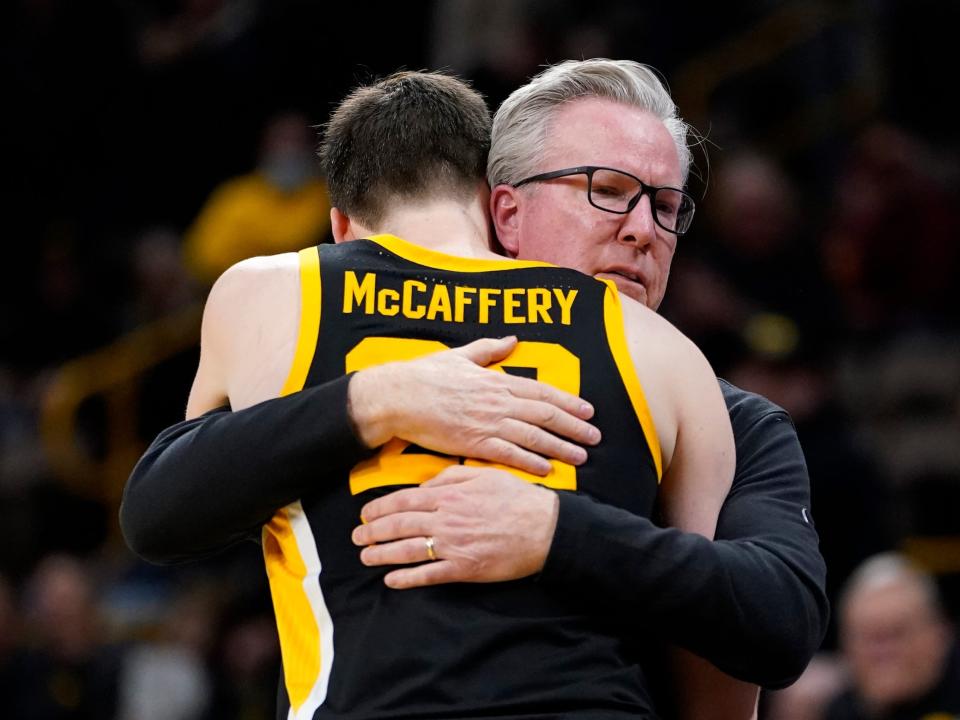 Patrick McCaffery (left) hugs his father and head coach, Fran.