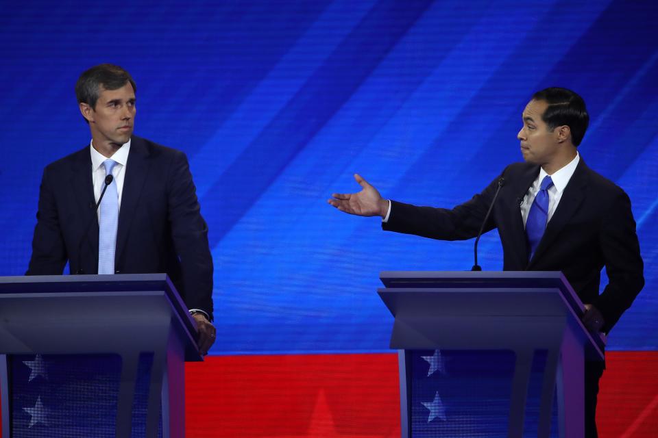 Democratic presidential candidate former Texas congressman Beto O'Rourke looks on as former housing secretary Julian Castro speaks during the Democratic Presidential Debate at Texas Southern University's Health and PE Center on Sept. 12, 2019 in Houston, Texas. Ten Democratic presidential hopefuls were chosen from the larger field of candidates to participate in the debate hosted by ABC News in partnership with Univision. 