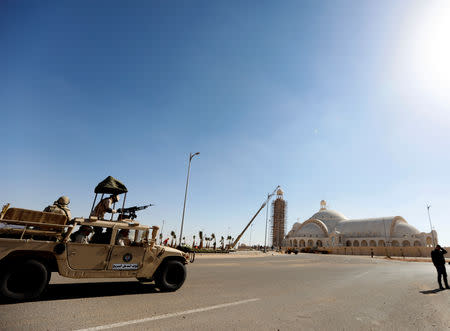 Members of the Egyptian Army guard outside the new Coptic Cathedral of the Nativity in the New Administrative Capital (NAC) east of Cairo, Egypt January 3, 2019. Picture taken January 3, 2019. REUTERS/Amr Abdallah Dalsh