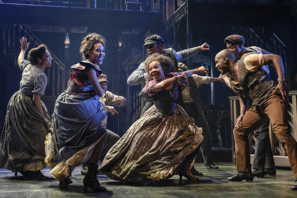 This image released by The Press Room shows, foreground from left, Hailee Kaleem Wright, Karen Burthwright and Sidney Dupont during a performance of the Tony-nominated musical "Paradise Square." (Alessandra Mello/The Press Room via AP)