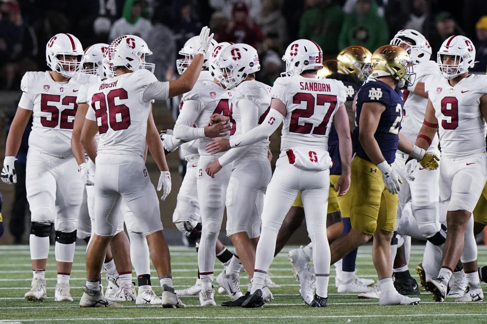 Stanford place-kicker Joshua Karty, center, celebrates with teammates after making a field goal during the second half of an NCAA college football game against Notre Dame in South Bend, Ind., Saturday, Oct. 15, 2022. Stanford won 16-14. (AP Photo/Nam Y. Huh)