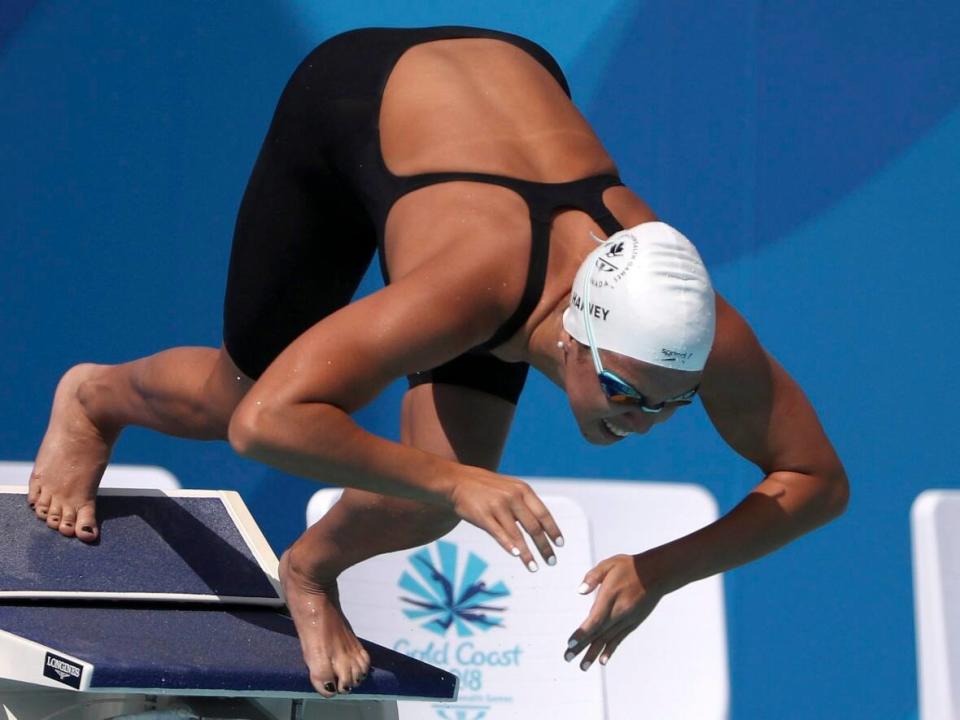 Canada's Mary-Sophie Harvey, seen competing at the 2018 Commonwealth Games in Australia, helped the Energy Standard edge the Cali Condors by 14 points in the International Swimming League final on Saturday in Eindhoven, Netherlands. (Rick Rycroft/The Associated Press - image credit)