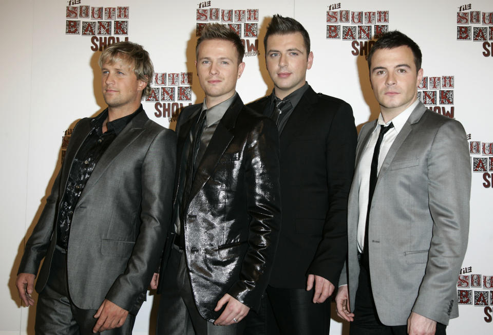 FILE - In this Tuesday, Jan. 29, 2008 file photo members of Irish band Westlife, from left, Kian Egan, Nicky Byrne, Mark Feehily and Shane Filan pose after performing at the South Bank Show Awards in London. After 14 years as one of Ireland's most successful boy bands, Westlife announced their split Thursday Oct. 20, 2011. (AP Photo/Sang Tan, file)