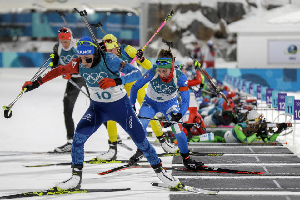 <p>Justine Braisaz, of France, leads the pack away from the shooting positions during the women’s 10-kilometer biathlon pursuit at the 2018 Winter Olympics in Pyeongchang, South Korea, Monday, Feb. 12, 2018. (AP Photo/Gregorio Borgia) </p>