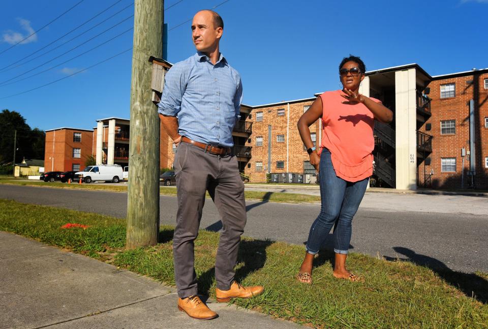 David Garfunkel, president of LIFT JAX, and Suzanne Pickett, president of Historic Eastside Community Development Corp., meet outside the Eastside Gardens apartments in 2021. They were working on a plan to use $3 million in city funds to bring affordable housing to the Eastside neighborhood.