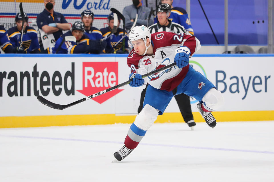 ST LOUIS, MO - APRIL 22:  Nathan MacKinnon #29 of the Colorado Avalanche shoots the puck against the St. Louis Blues at Enterprise Center on April 22, 2021 in St Louis, Missouri. (Photo by Dilip Vishwanat/Getty Images)