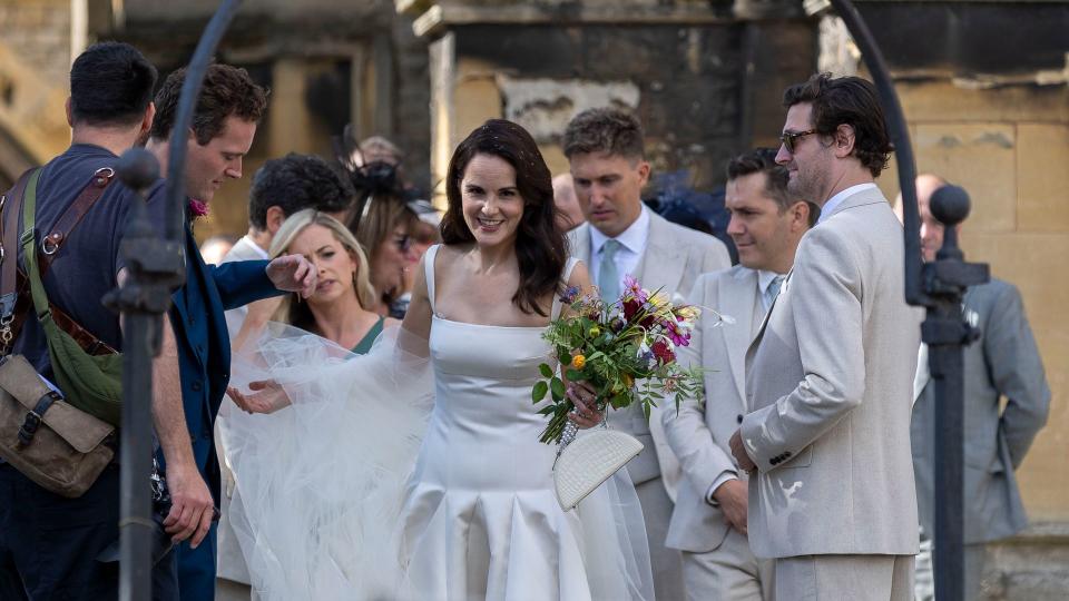 Laura Carmichael acts as a bridesmaid for Michelle Dockery as she ties the knot with Jasper Waller-Bridge