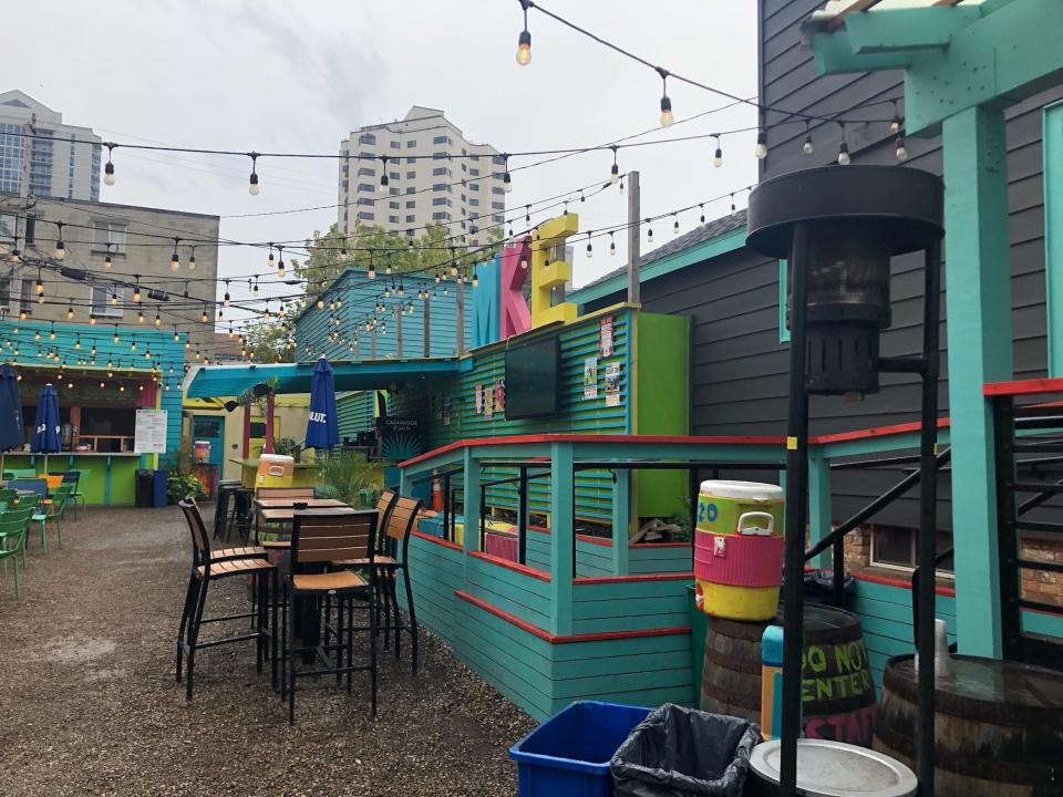 Nomad World Pub has a large, colorful outdoor patio. In this October 2021 photo it is gearing up for winter with outdoor heaters.