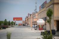 An empty street in Guangzhou New City, a 1.5 million square metre 'urban centre' on the outskirts of Kashgar in China's western Xinjiang province