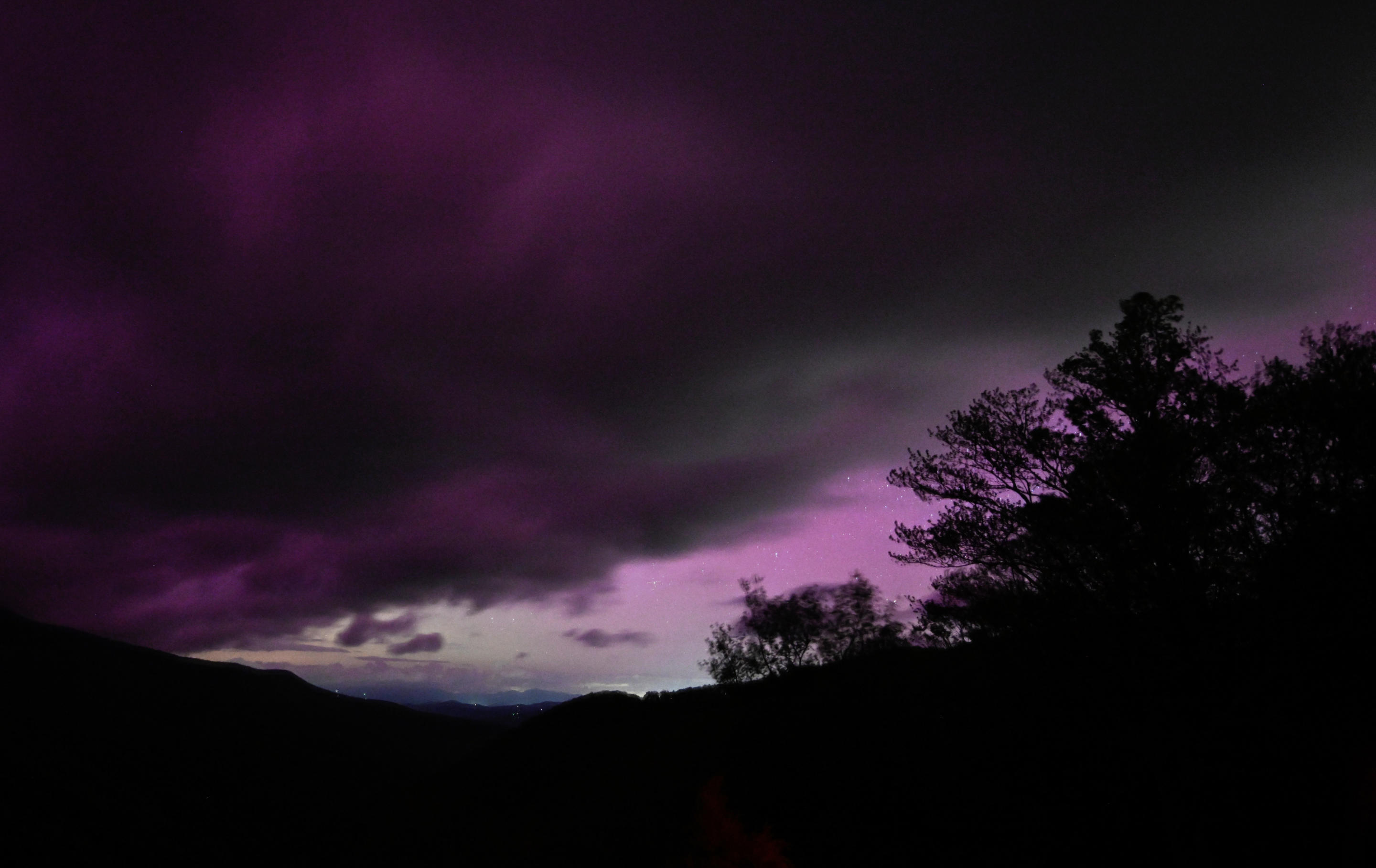 MOUNT MITCHELL, UNITED STATES - MAY 10: Unusual sun activity created a G5 Geostorm on Earth sparks northern lights (Aurora Borealis) in Mount Mitchell, North Carolina, United States on May 10, 2024. (Photo by Peter Zay/Anadolu via Getty Images)