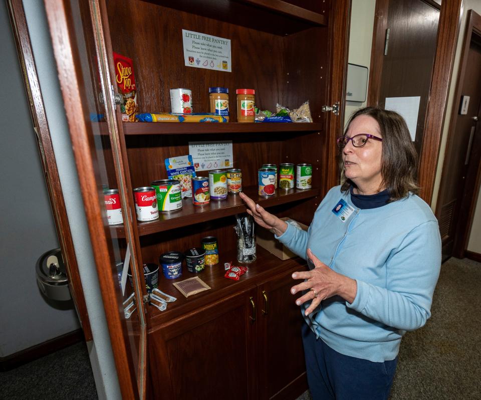Diane Jaroch, interim library director, speaks about a free food cupboard at the Irvin L. Young Memorial Library on Wednesday January 10, 2024 in Whitewater, Wis.