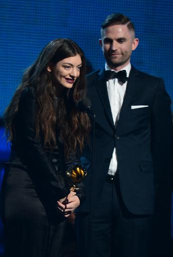 Winners for Best Song Of The Year "Royals" Lorde and Joel Little accept the trophy on stage during the 56th Grammy Awards at the Staples Center in Los Angeles, California, January 26, 2014