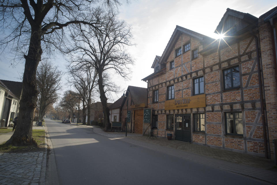 In this Thursday, Feb. 28, 2019 photo, the sun shines over the roof top of the German whiskey maker Spreewood Distillery in Schlepzig, Germany. (AP Photo/Markus Schreiber)