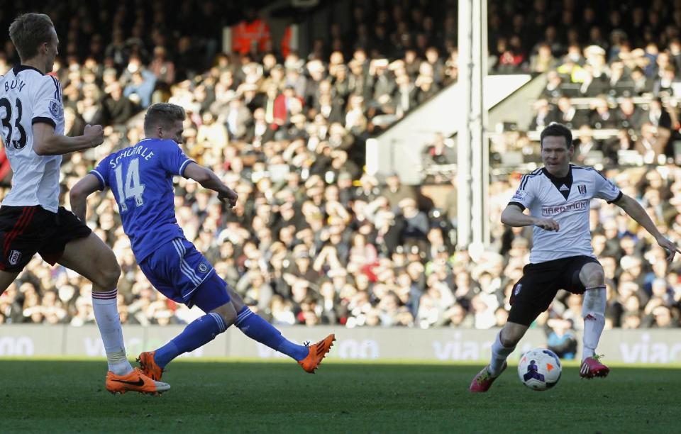 Chelsea's Andre Schurrle, second left, scores against Fulham during their English Premier League soccer match at Craven Cottage, London, Saturday, March 1, 2014. (AP Photo/Sang Tan)