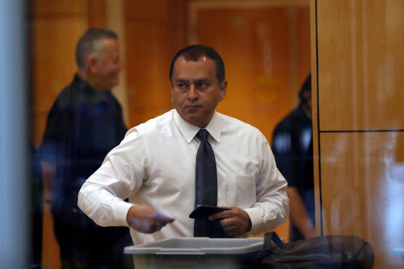 FILE PHOTO: Former Theranos president and COO Ramesh "Sunny" Balwani arrives for hearing in federal court in San Jose