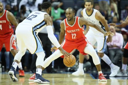 Oct 11, 2017; Memphis, TN, USA; Houston Rockets forward Luc Mbah a Moute (12) defends against Memphis Grizzlies guard Tyreke Evans (12) at FedExForum. Mandatory Credit: Houston won 101-89. Nelson Chenault-USA TODAY Sports