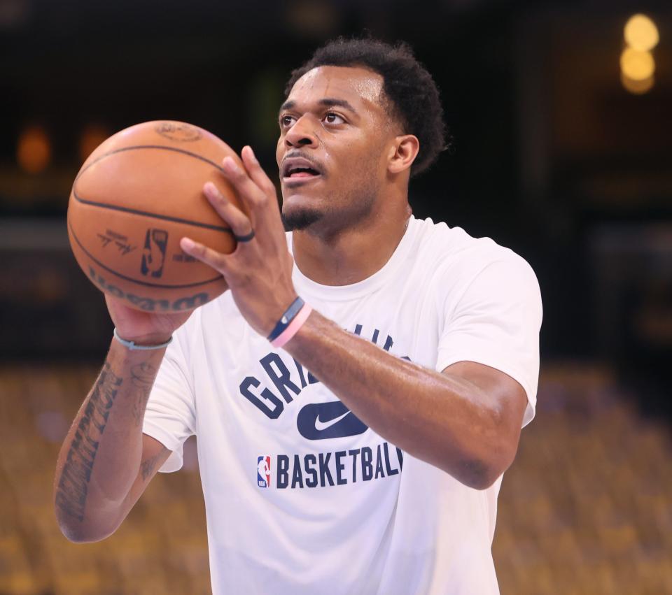 May 1, 2022; Memphis, Tennessee, USA; Memphis Grizzlies center Xavier Tillman warms up before they play the Golden State Warriors for game one of the second round for the 2022 NBA playoffs at FedExForum. Mandatory Credit: Joe Rondone-USA TODAY Sports