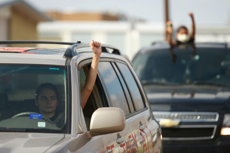 Protesters participate in a car caravan to increase the pressure on ICE to release GEO detainees in front of GEO Aurora ICE Processing Center in Aurora, Colorado. April 9, 2020. | Photo by Hyoung Chang/MediaNews Group/The Denver Post via Getty Images