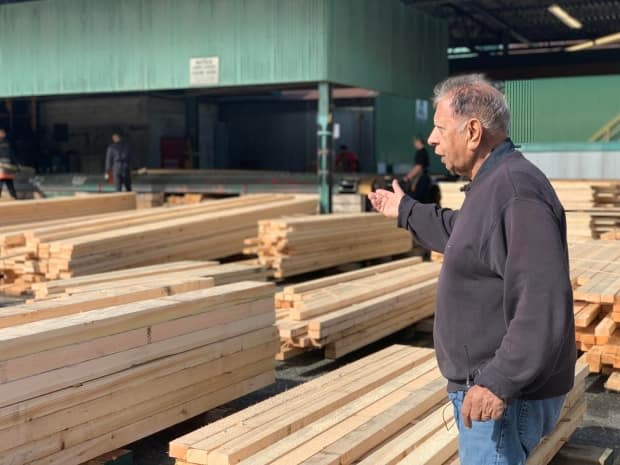 Tom Sundher of Sundher Timber Products is unsure how to proceed with his business dealings in China.  (Tanya Fletcher/CBC - image credit)